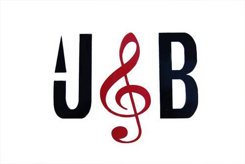 J B
